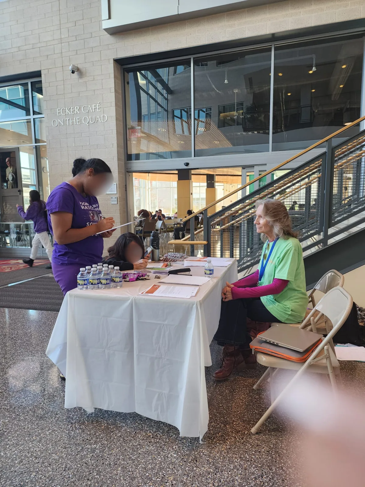 R1YC representative staffing an information table at Howard Community College
