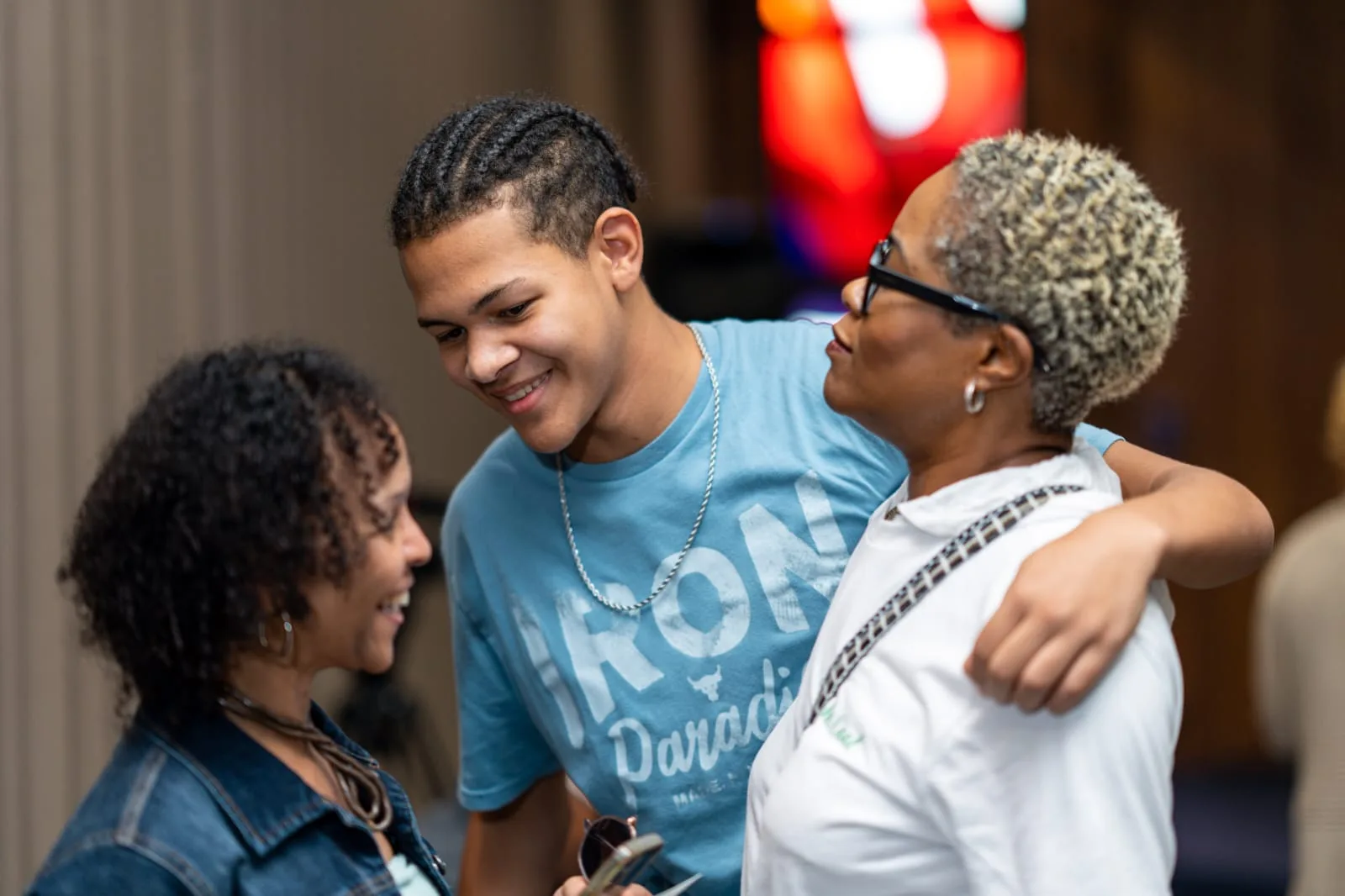 Program participants greeting one another during the event