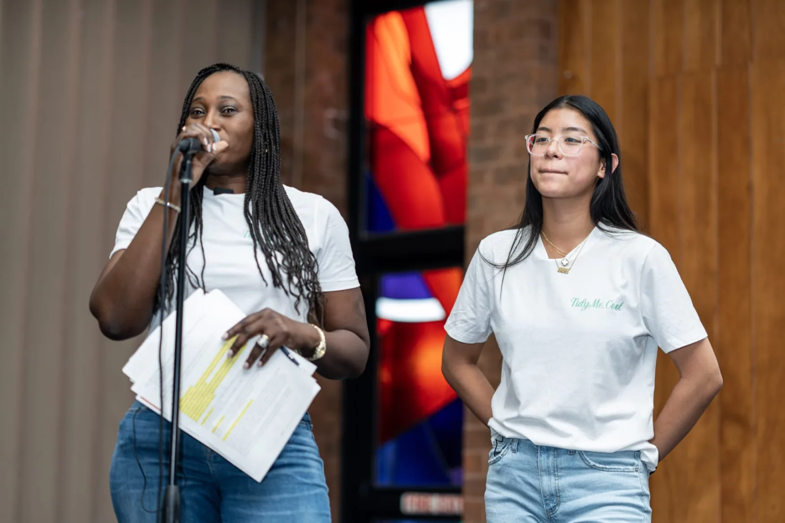 Two young speakers presenting to program attendees